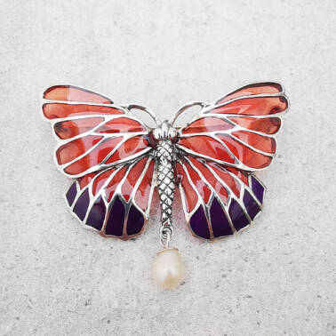 Kolorowa broszka motyl z perełką.